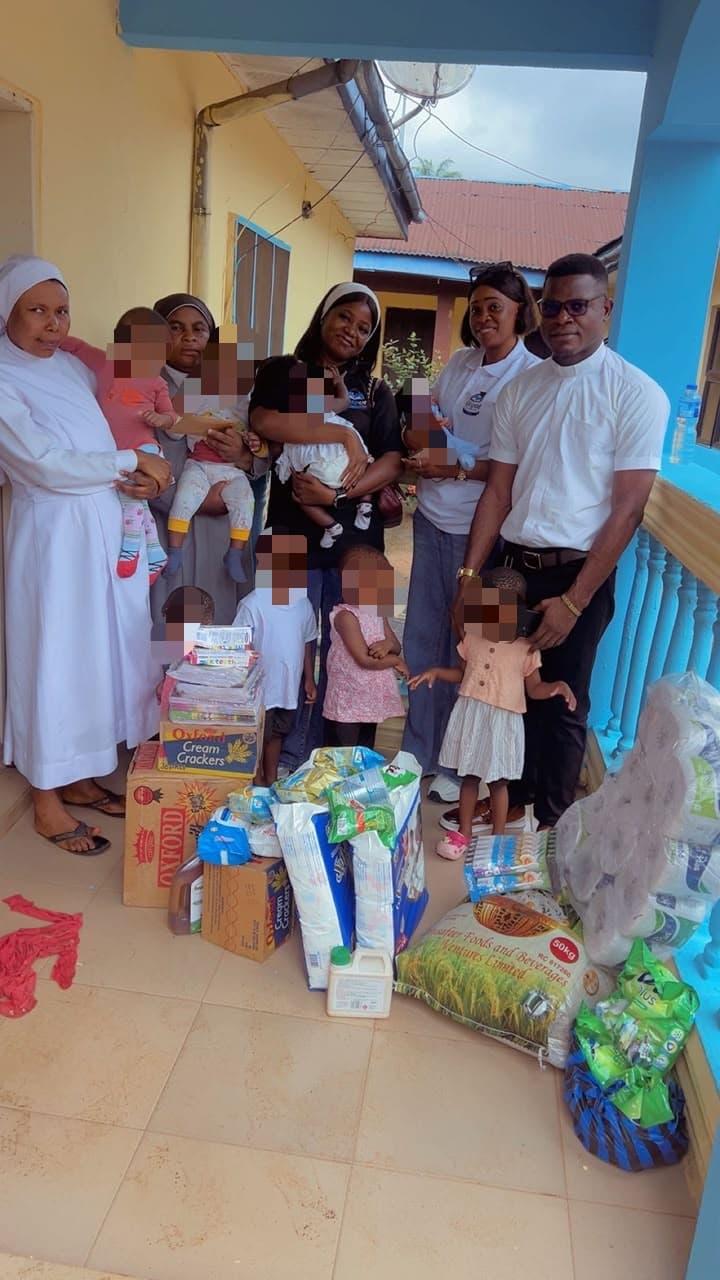 OnSpot Learning Academy team presenting donated essentials at Stella Giordano Orphanage Home